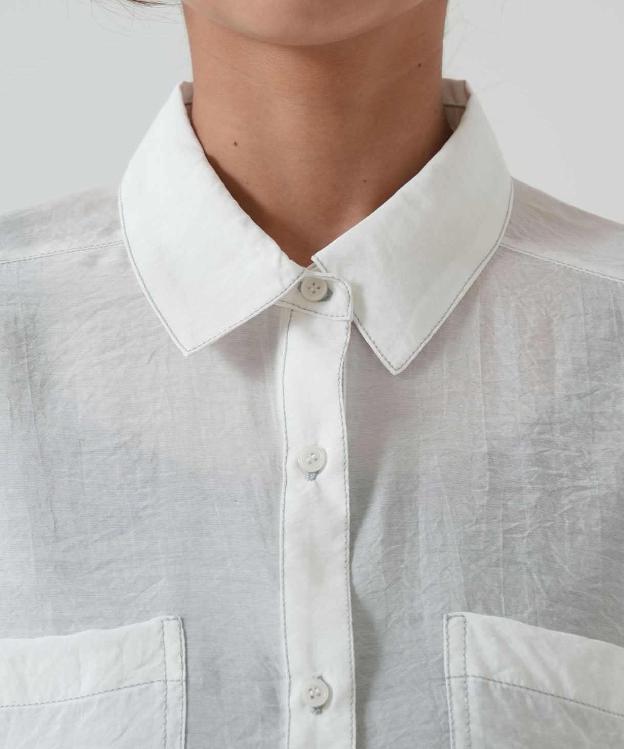 Color-contrast stitch sheer shirt
