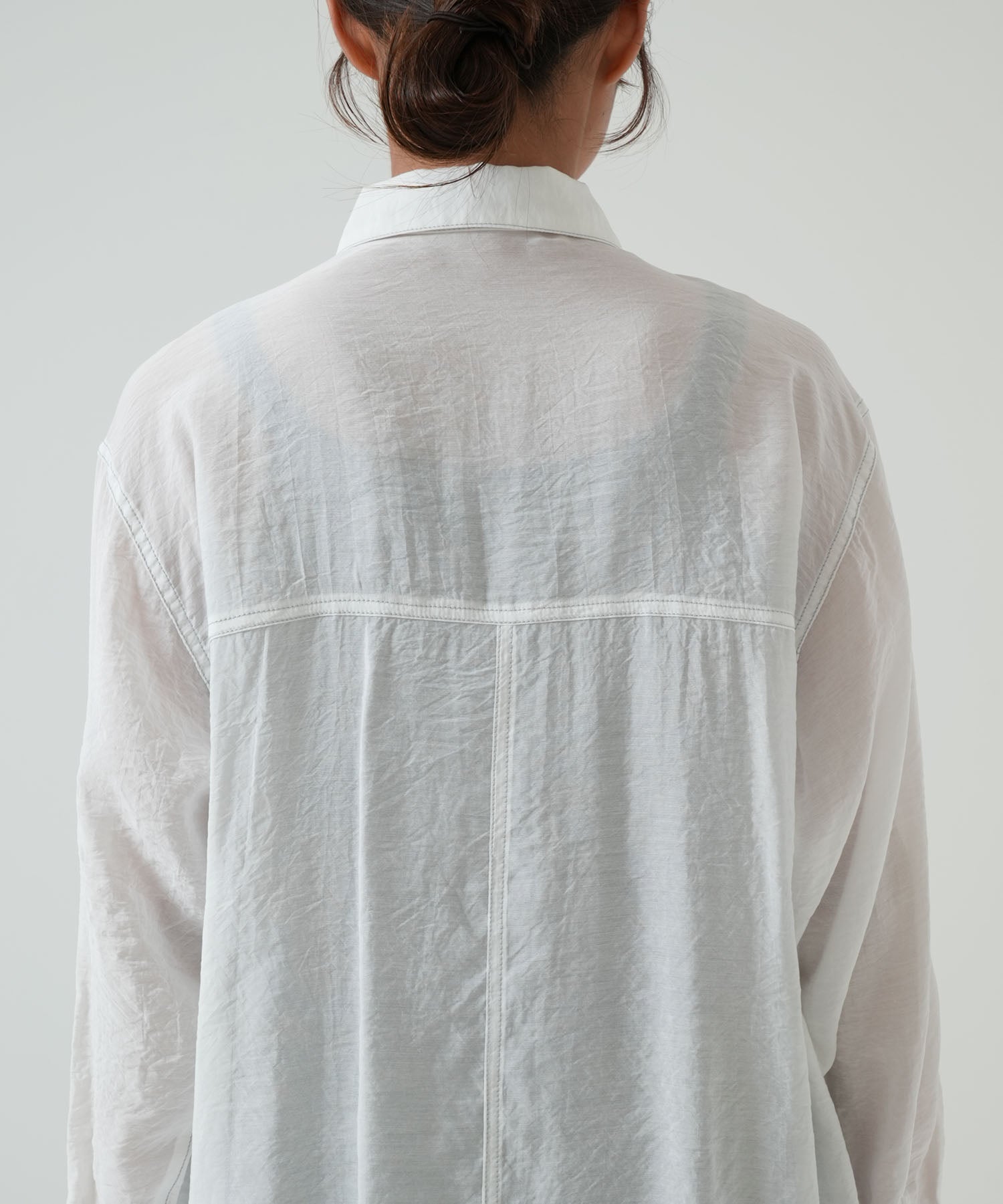 Color-contrast stitch sheer shirt